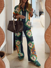 Pantalones anchos con bolsillos y cintura elástica con estampado gráfico coral único en su tipo